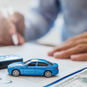istockphoto-1173046836-170667a Sale agent deal to agreement successful car loan contract with customer and sign agreement contract Insurance car concept.